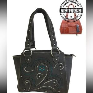 Montana West Concealed Carry Swirl Leather Purse  with a swirl cutout design.